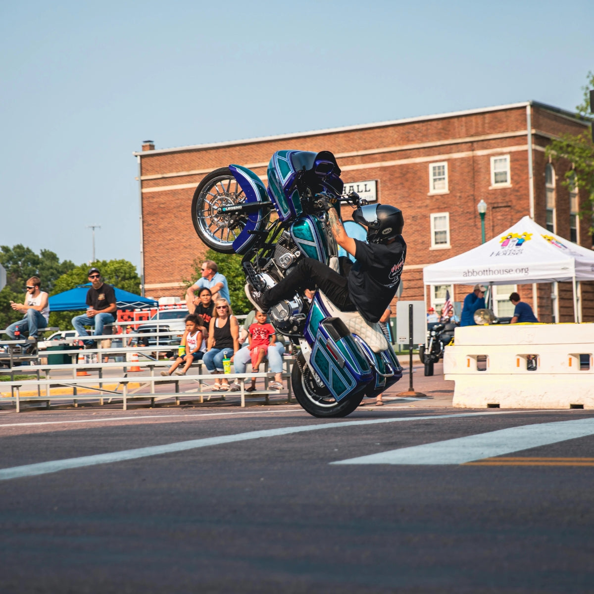 Motorcycle stunt during Mitchell South Dakota's Pre-Sturgis Party.
