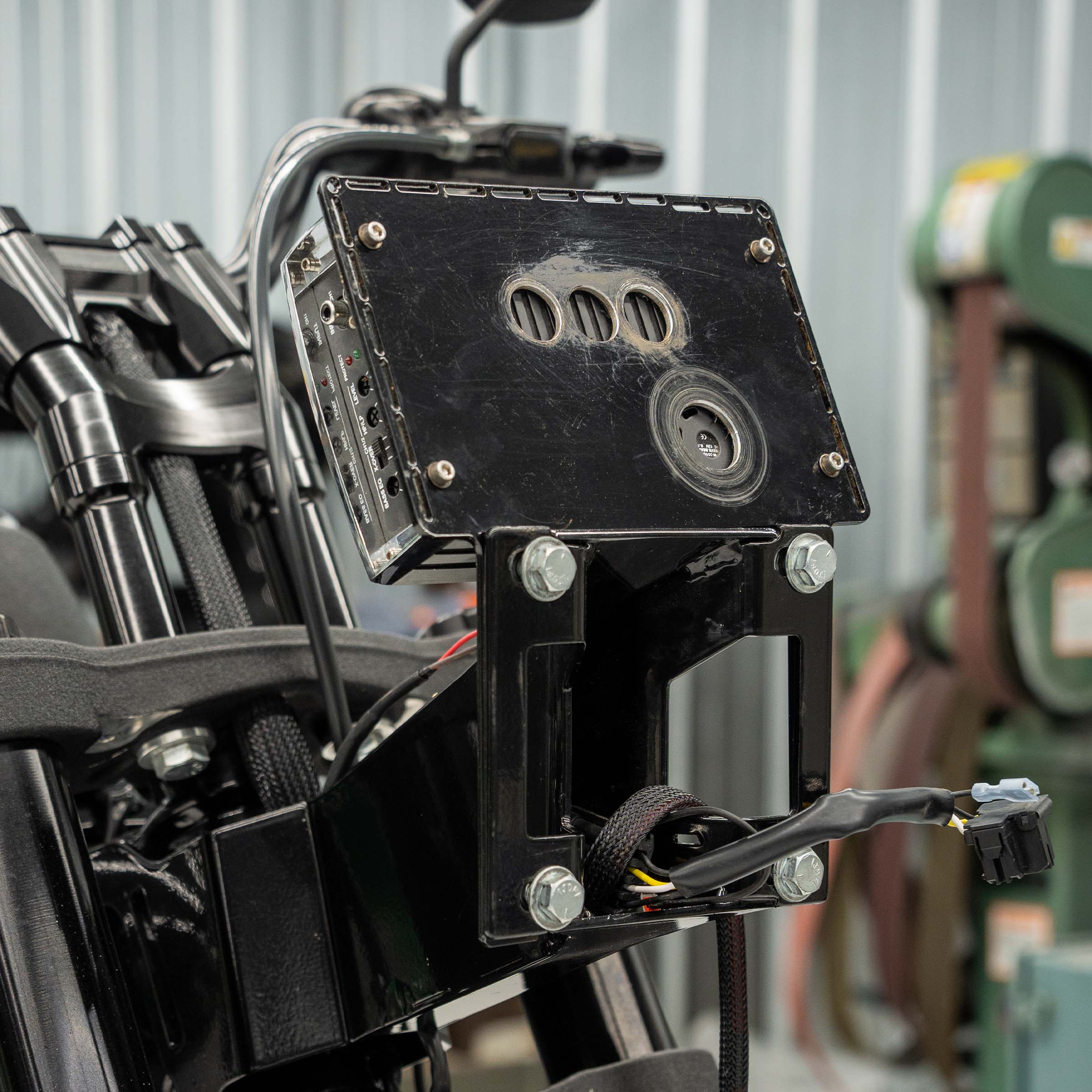 Universal Amp Bracket for FXR Style Fairings including FXRP, FXRT and FXRD (Universal Amp Bracket In Use)