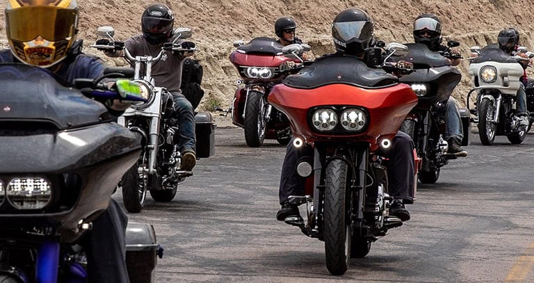 Motorcyclists riding through the Badlands in South Dakota.