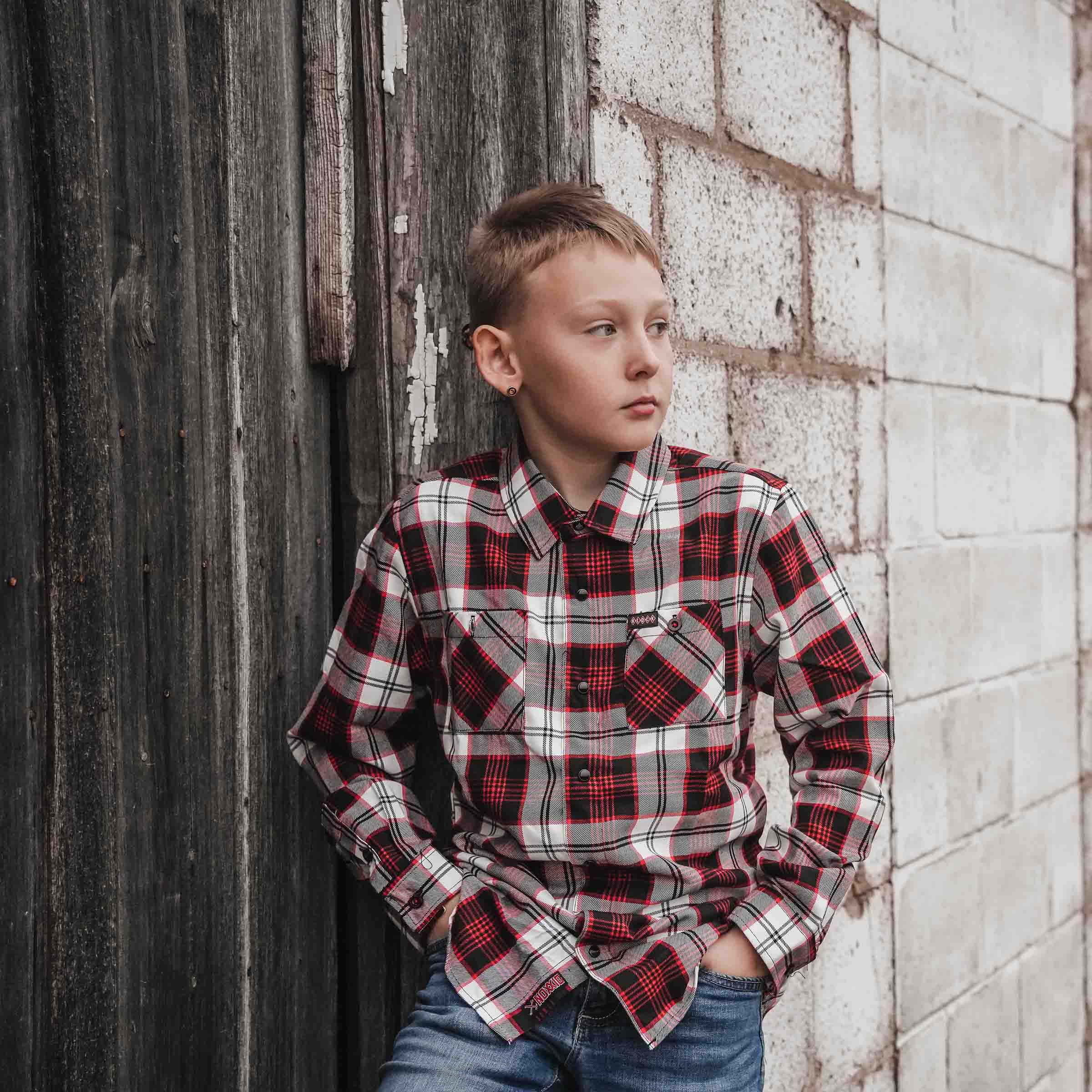 Klock Werks x Dixxon 25th Anniversary Flannel. Brantley is wearing a Youth Large.(Brantley is wearing a youth large.)
