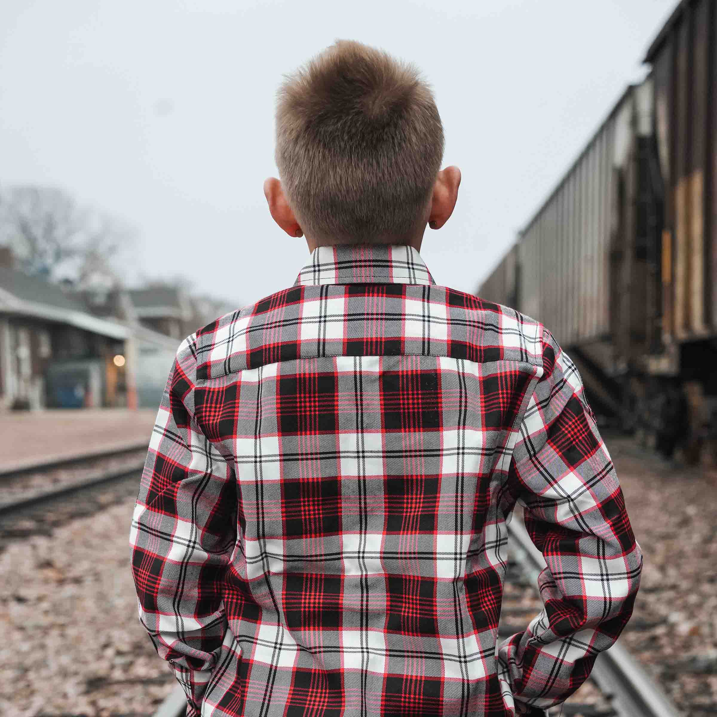 Klock Werks x Dixxon 25th Anniversary Flannel. Brantley is wearing a Youth Large.(Brantley is wearing a youth large.)