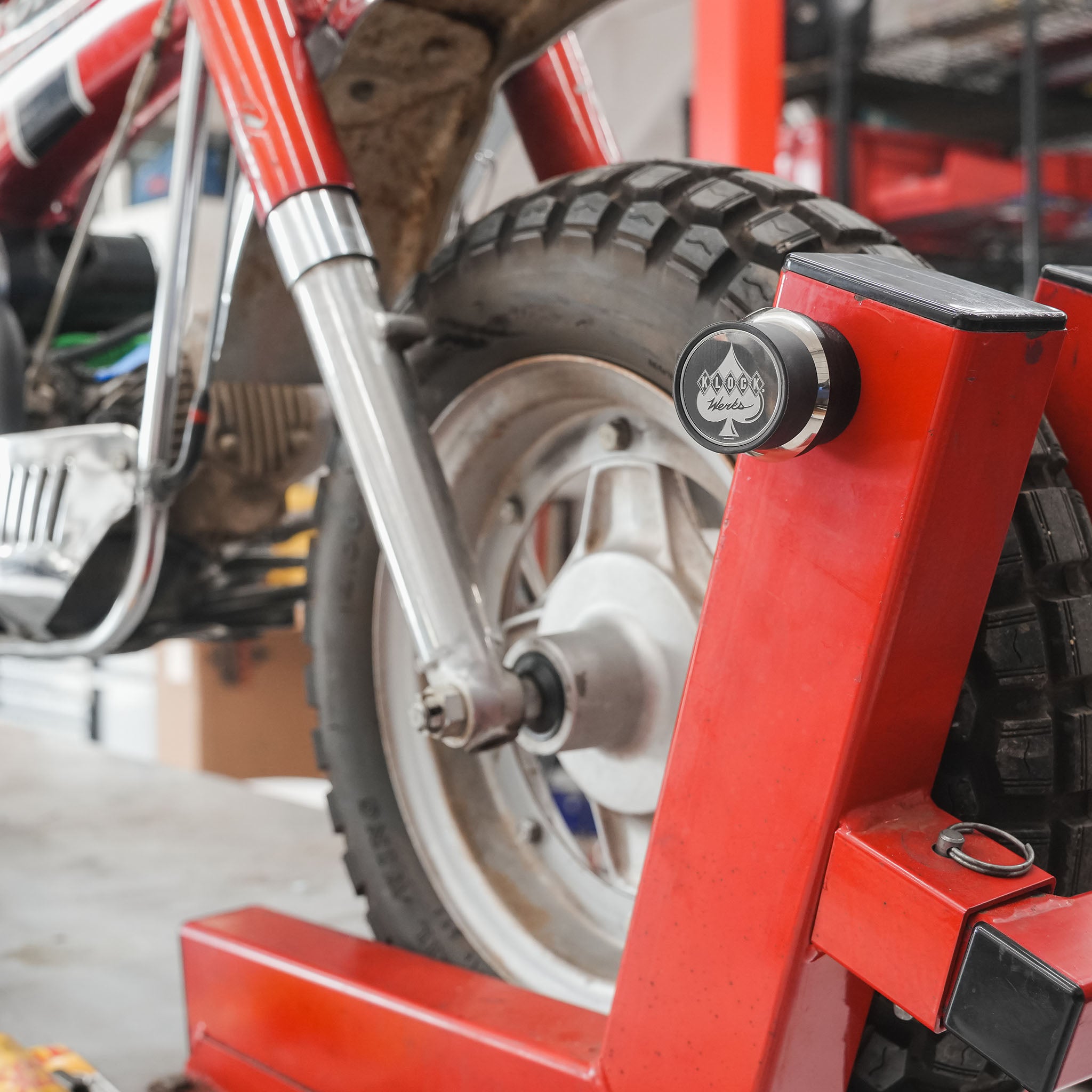iOkwik Magnetic Universal Phone Mount shown mounted to bike lift(in the shop)