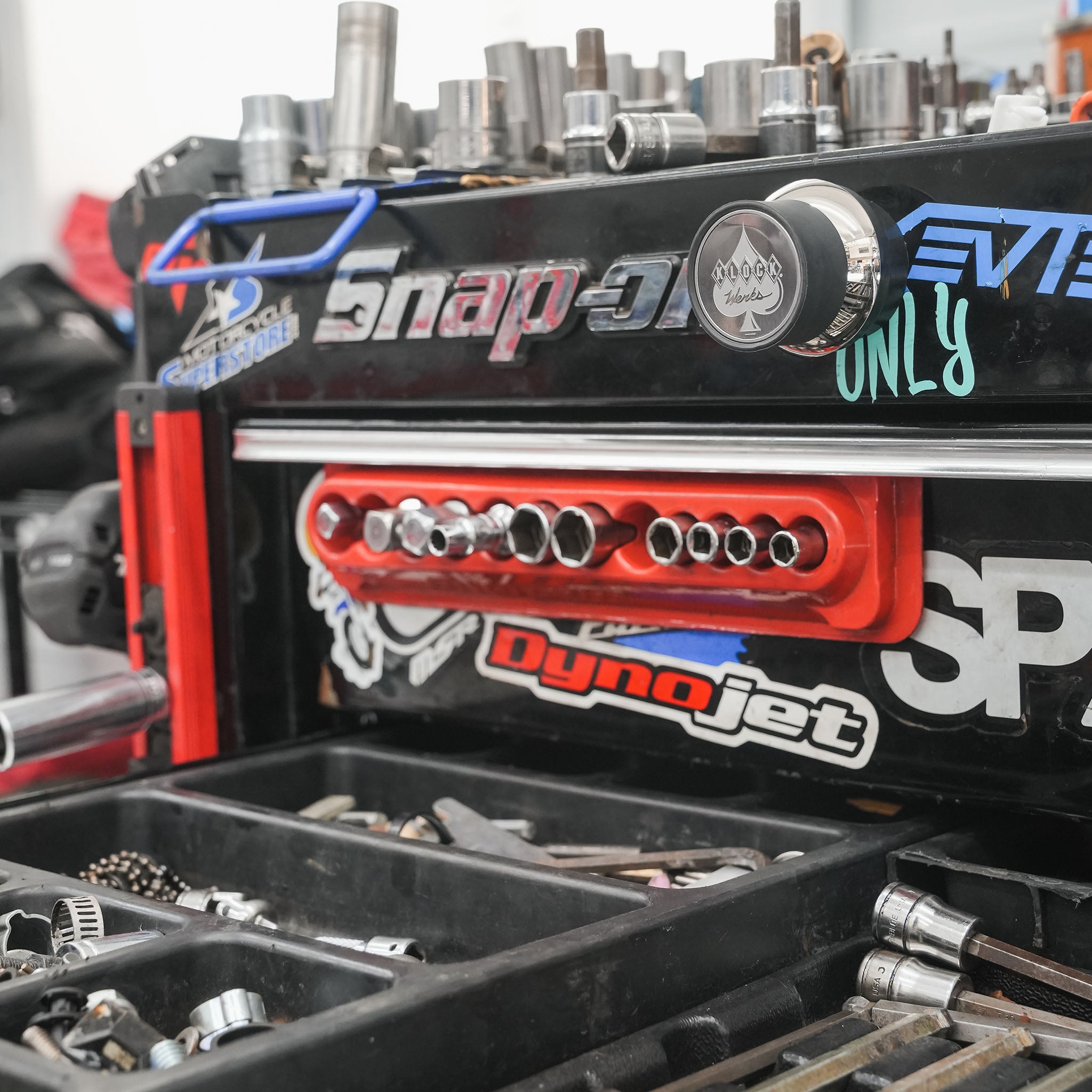 iOkwik Magnetic Universal Phone Mount shown mounted to toolbox(in the shop)