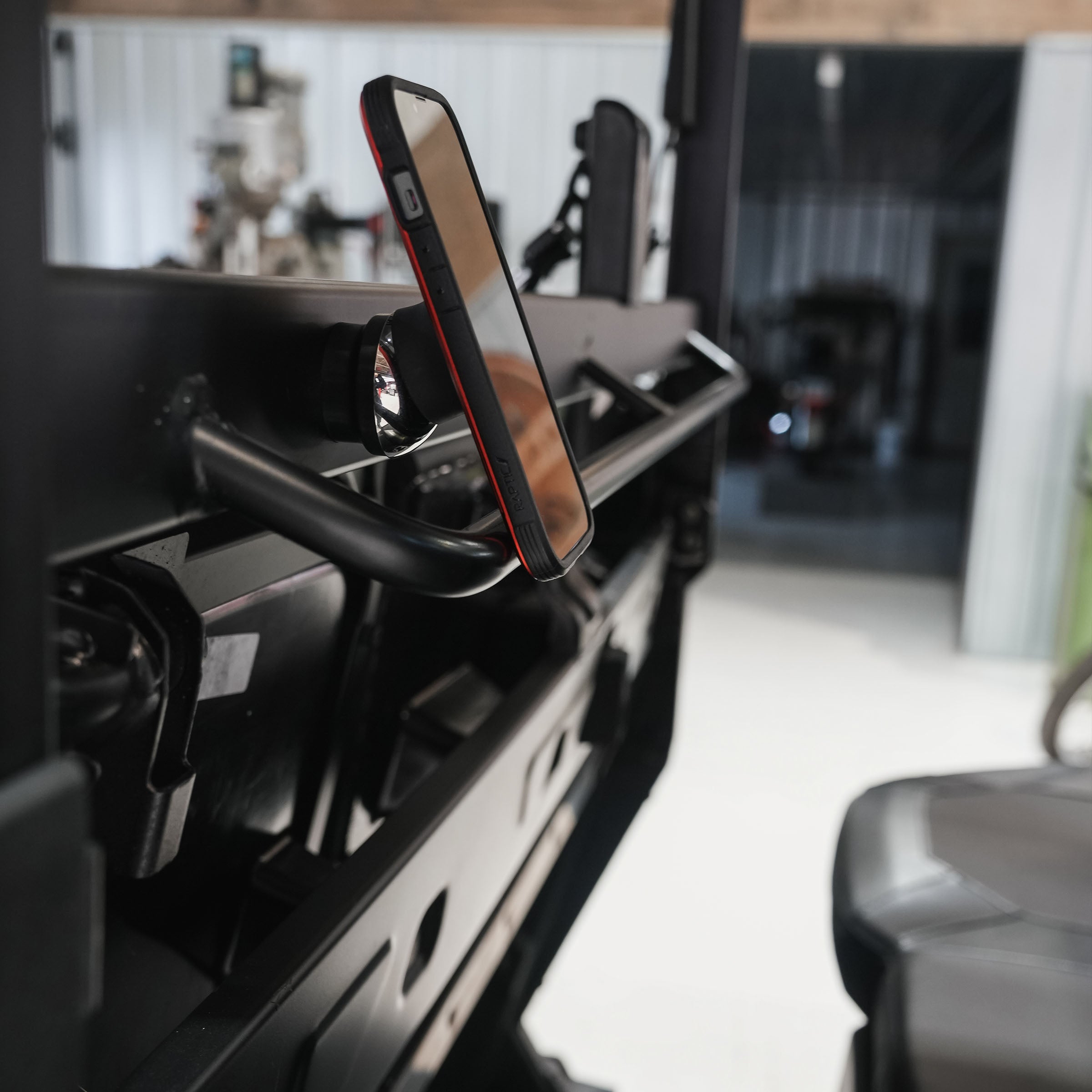 iOkwik Magnetic Universal Phone Mount shown mounted to UTV dash(mounted to UTV dash)