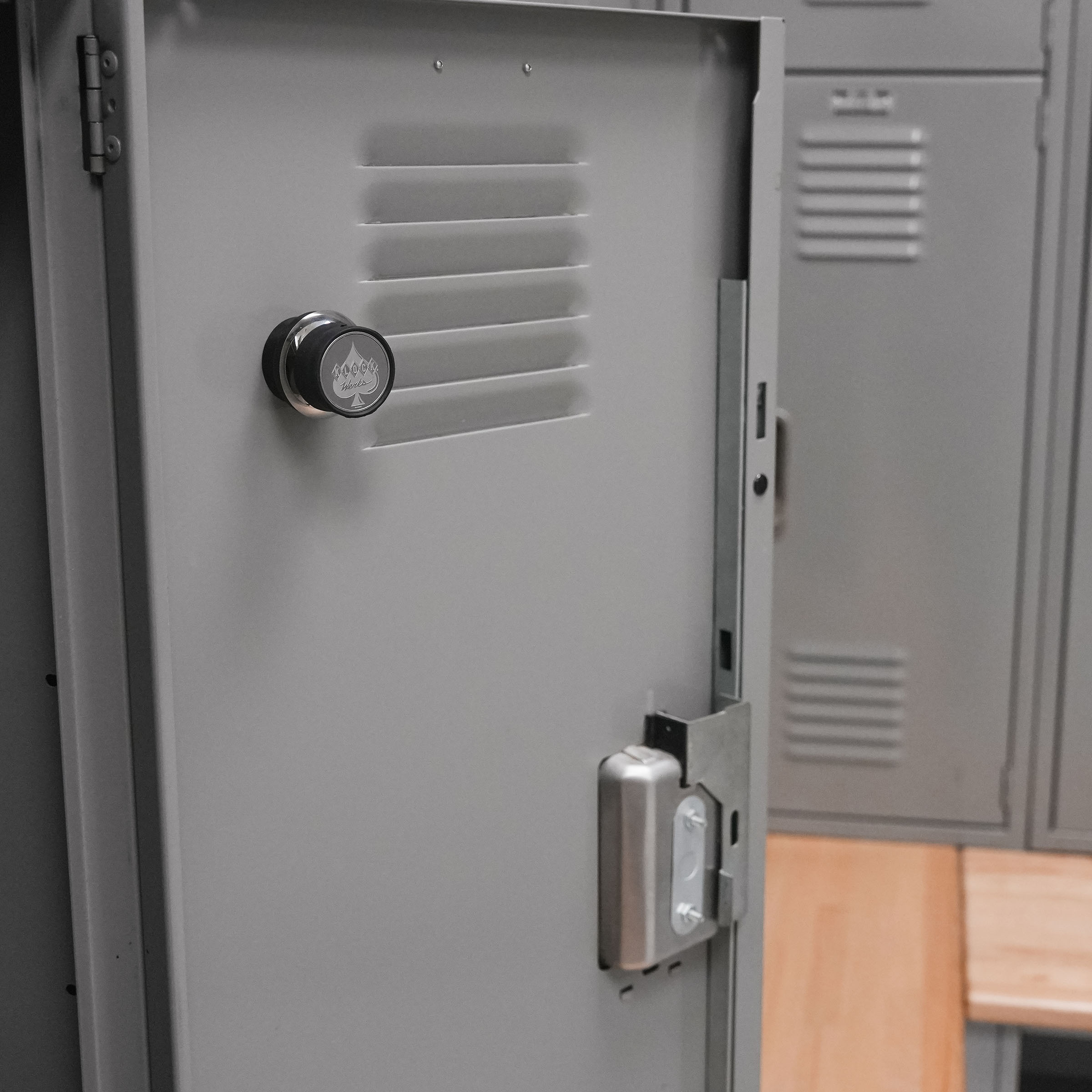 iOkwik Magnetic Universal Phone Mount shown mounted to locker(mounted to locker)