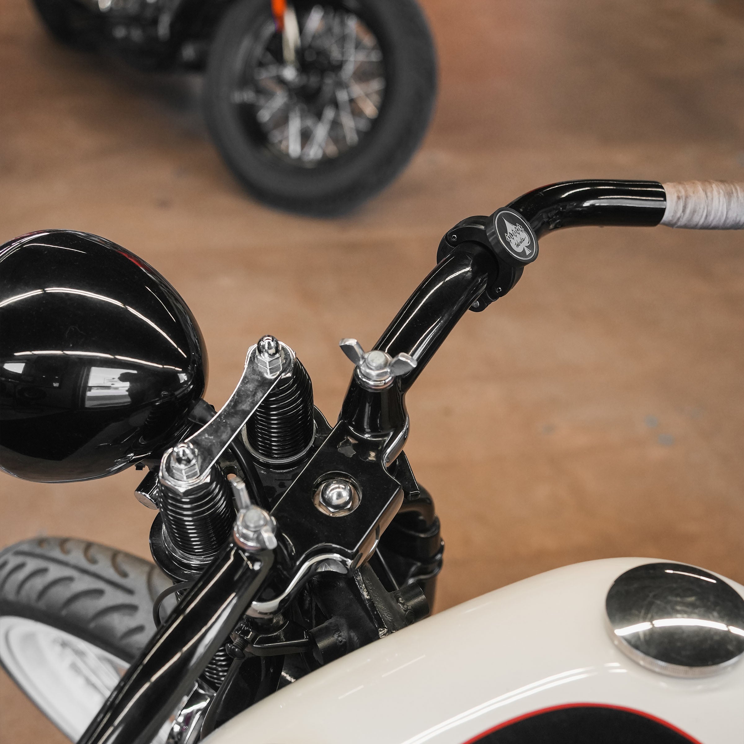 1.25" nomad+ Universal Bar Magnetic Phone Mount shown on motorcycle handlebars(1.25" on motorcycle bars)