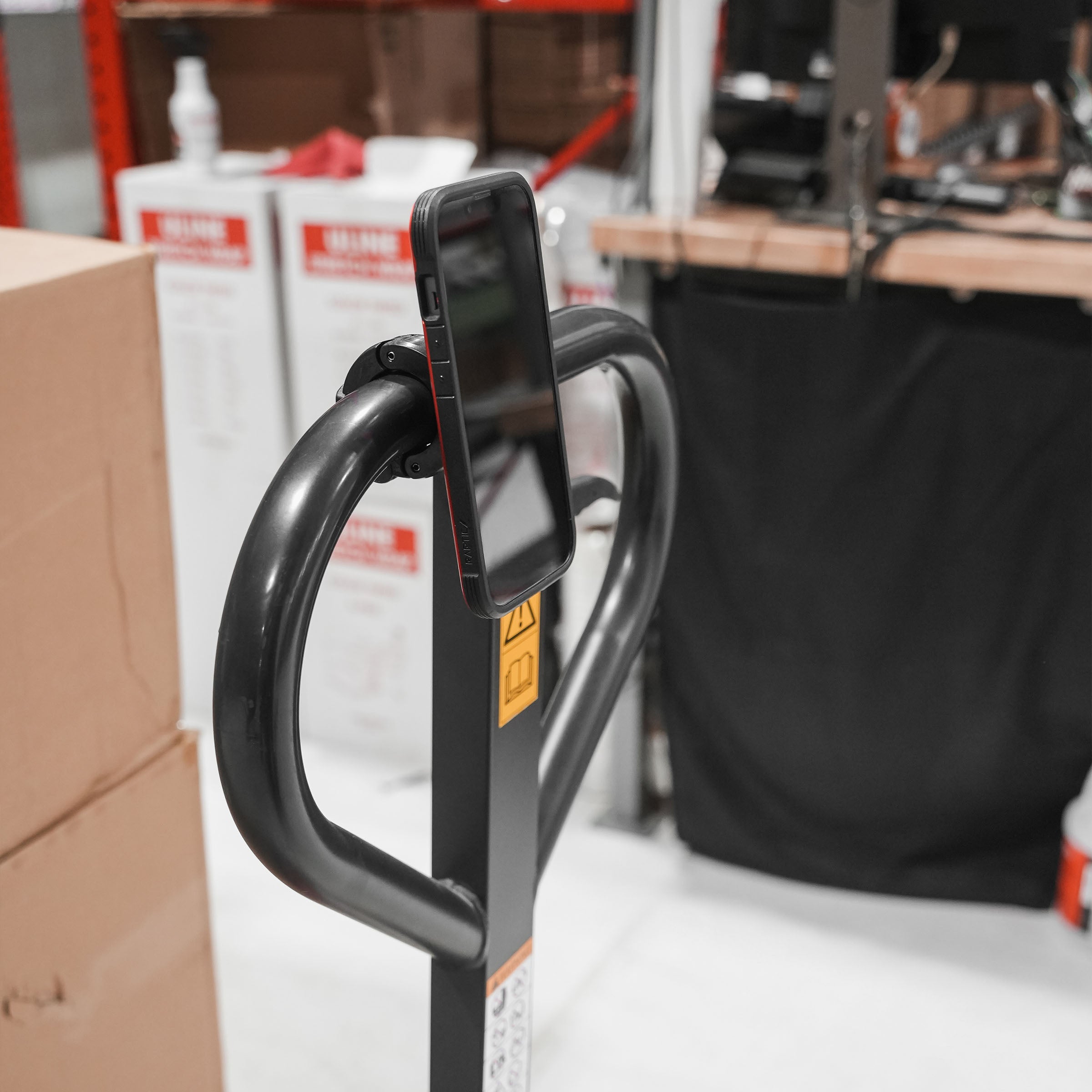 1.25" nomad+ Universal Bar Magnetic Phone Mount shown on lift handle(1.25" on lift handle)