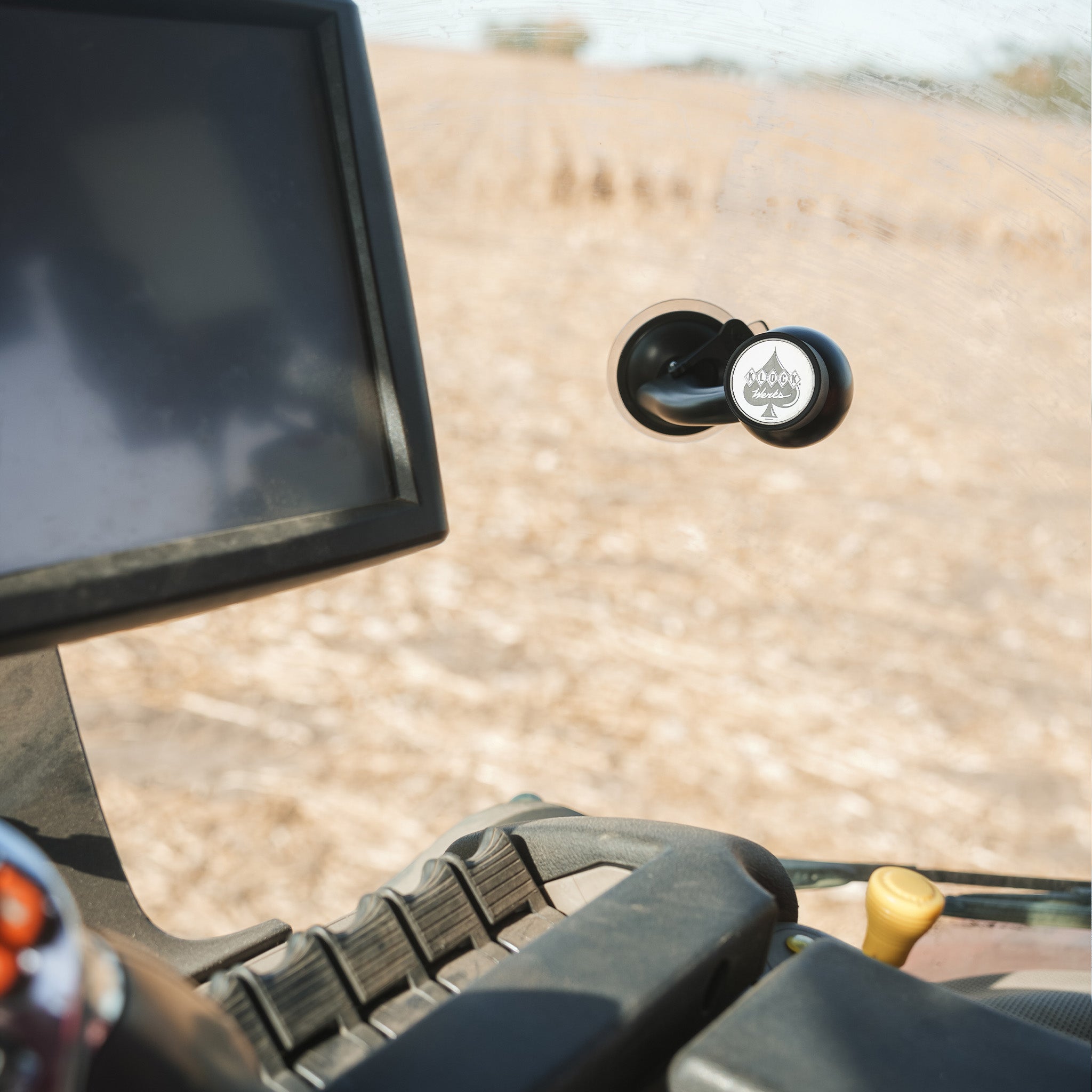 iOtraveler Suction Phone Mount shown mounted for tractor suction phone mount for car (mounted on combine window)