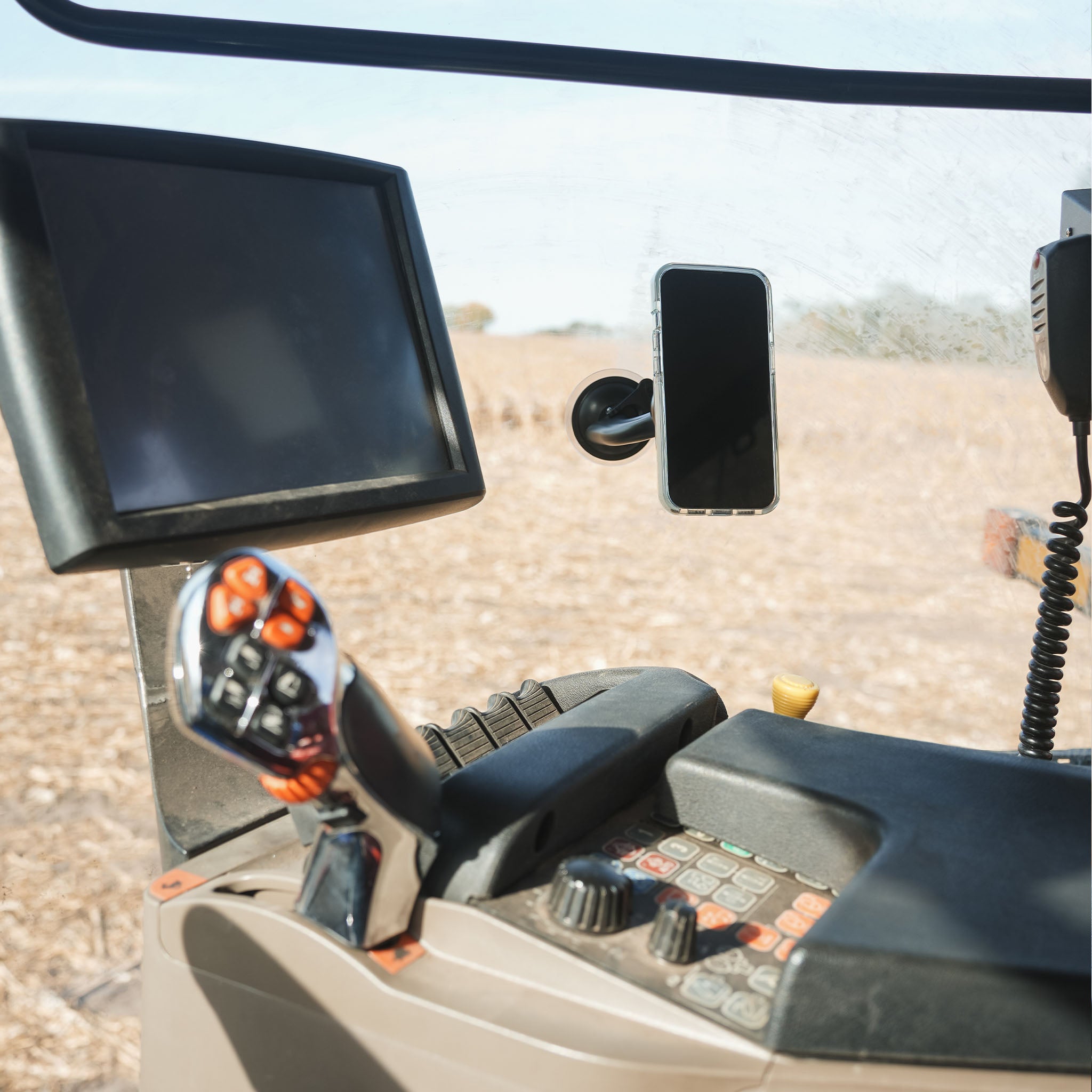 iOtraveler Suction Magnetic Phone Mount shown mounted on combine window(mounted on combine window)