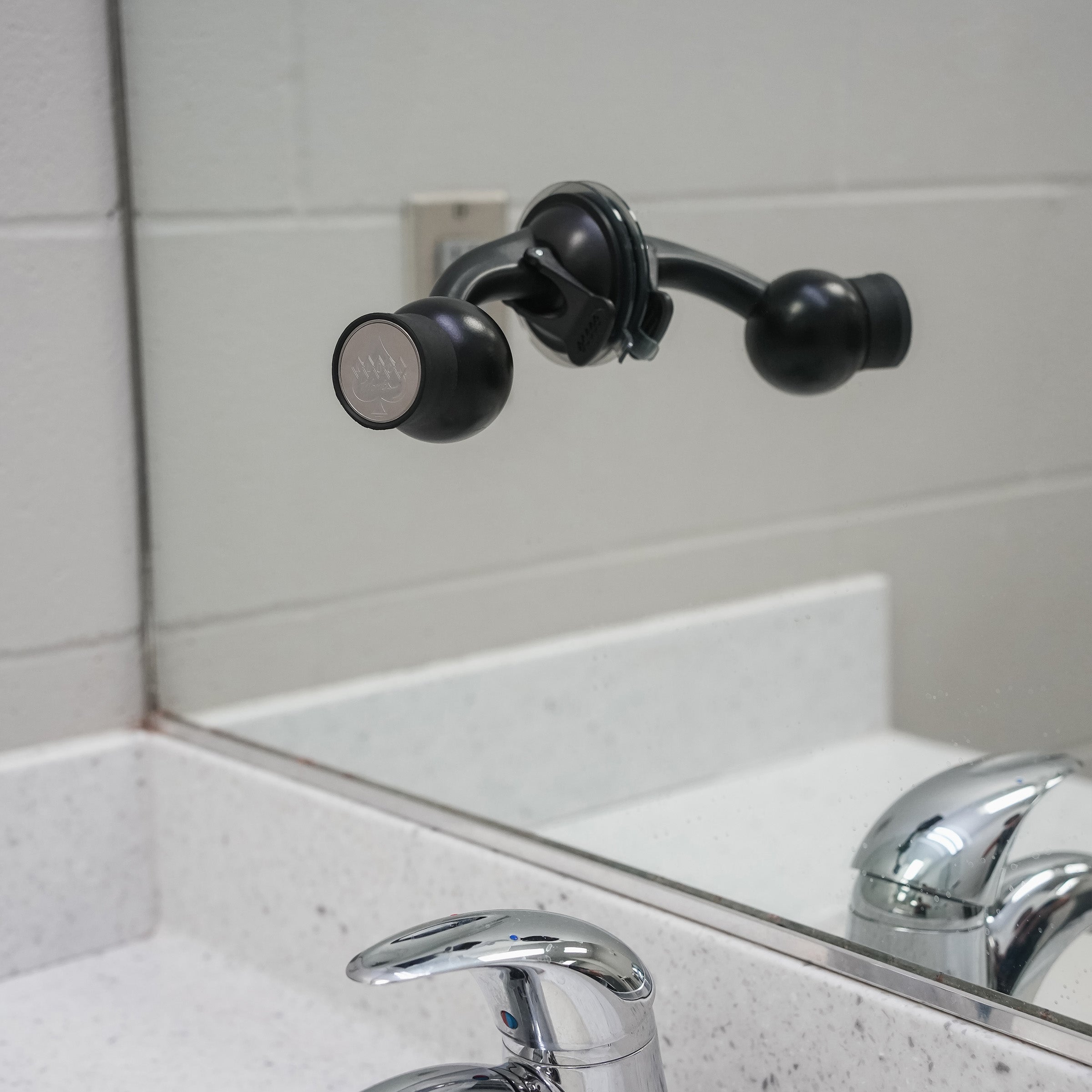 iOtraveler Suction Magnetic Phone Mount shown mounted to mirror(mounted to mirror)