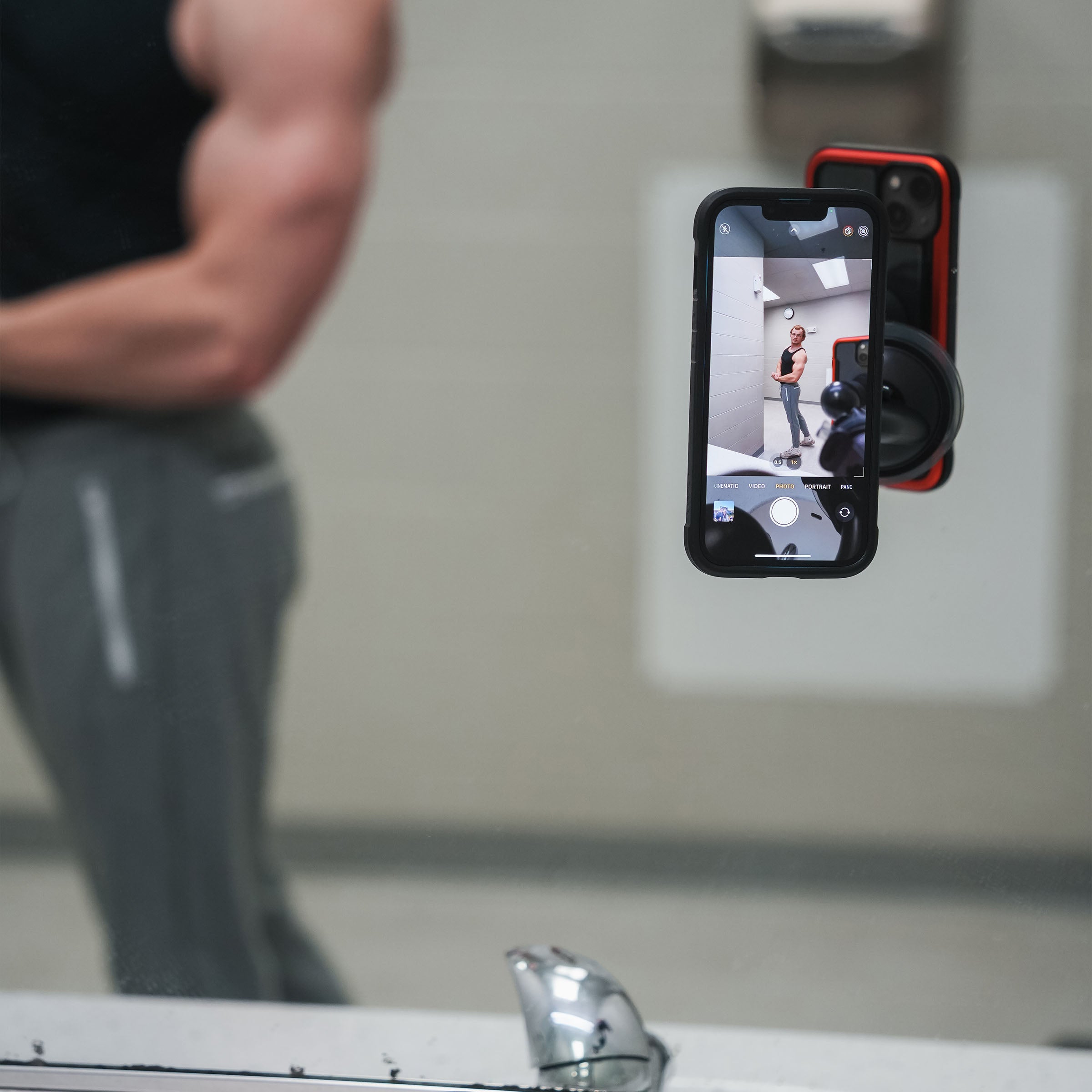 iOtraveler Suction Magnetic Phone Mount shown mounted to mirror. Works great for selfies!(mounted to mirror - great for selfies!)