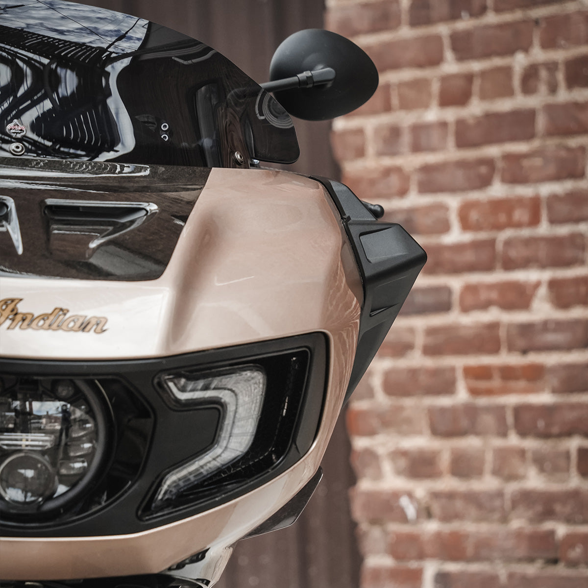 The right side of a fairing showing the Wings for Indian Challenger and Indian Pursuit Motorcycles installed from the front