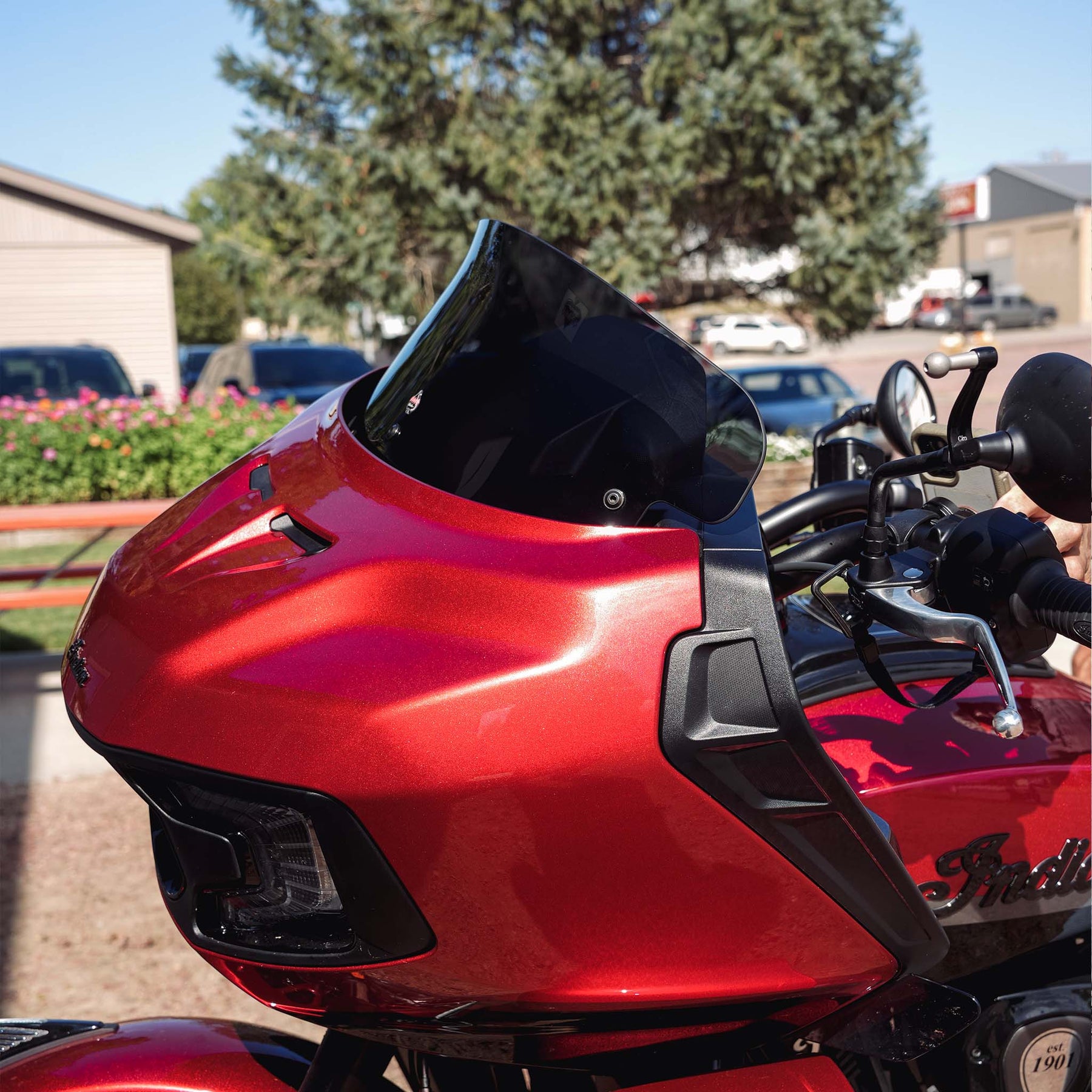 8" Dark Smoke Flare™ Windshield For 2020-2023 Indian® Challenger and Pursuit motorcycle models shown in down position