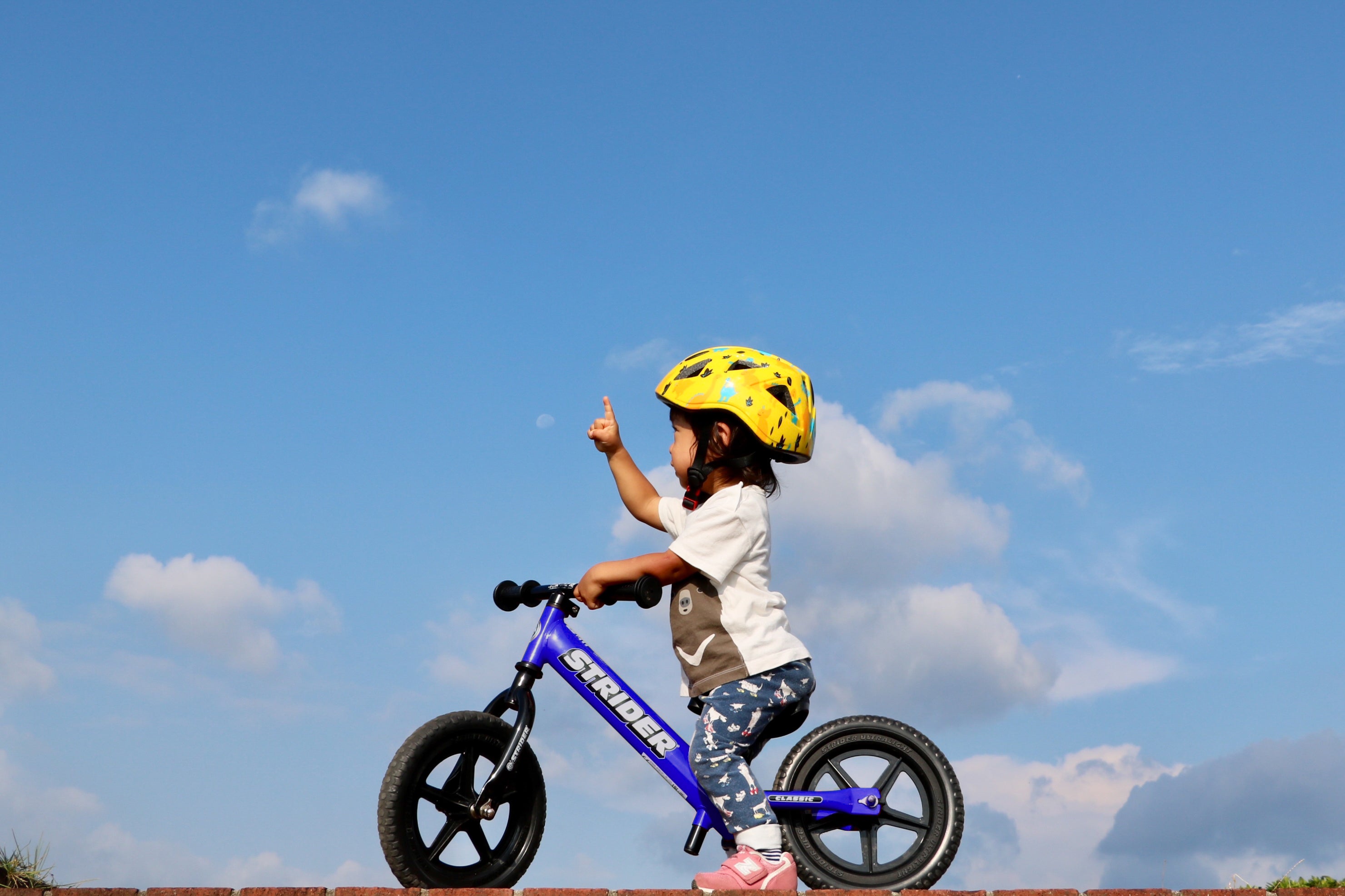 Blue 12" Classic Strider Balance Bike Blue in use (12" Classic - Blue in use)