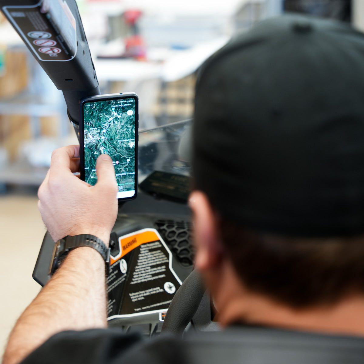 Roll Cage Magnetic Phone Mount mounted in use (Roll Cage Phone Mount mounted in use)