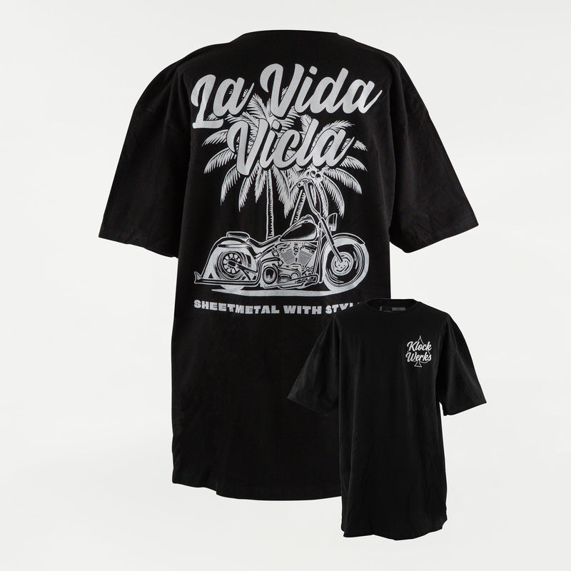 Black t-shirt with 'La Vida Vicla' graphic design featuring a motorcycle and palm tree on a white background.