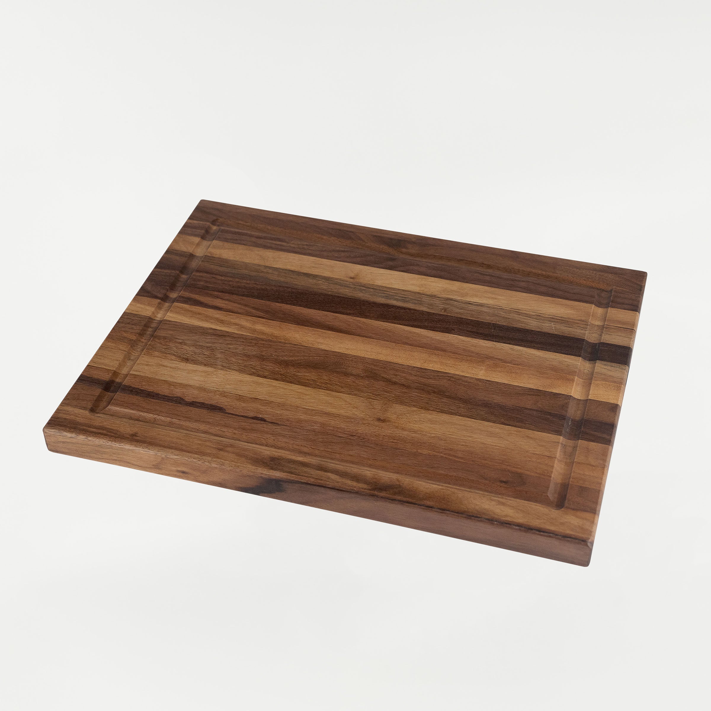 Klock Werks x White Knuckler Limited Edition Chef Set American walnut cutting board with recessed pocket and 44 lb magnet for secure storage.