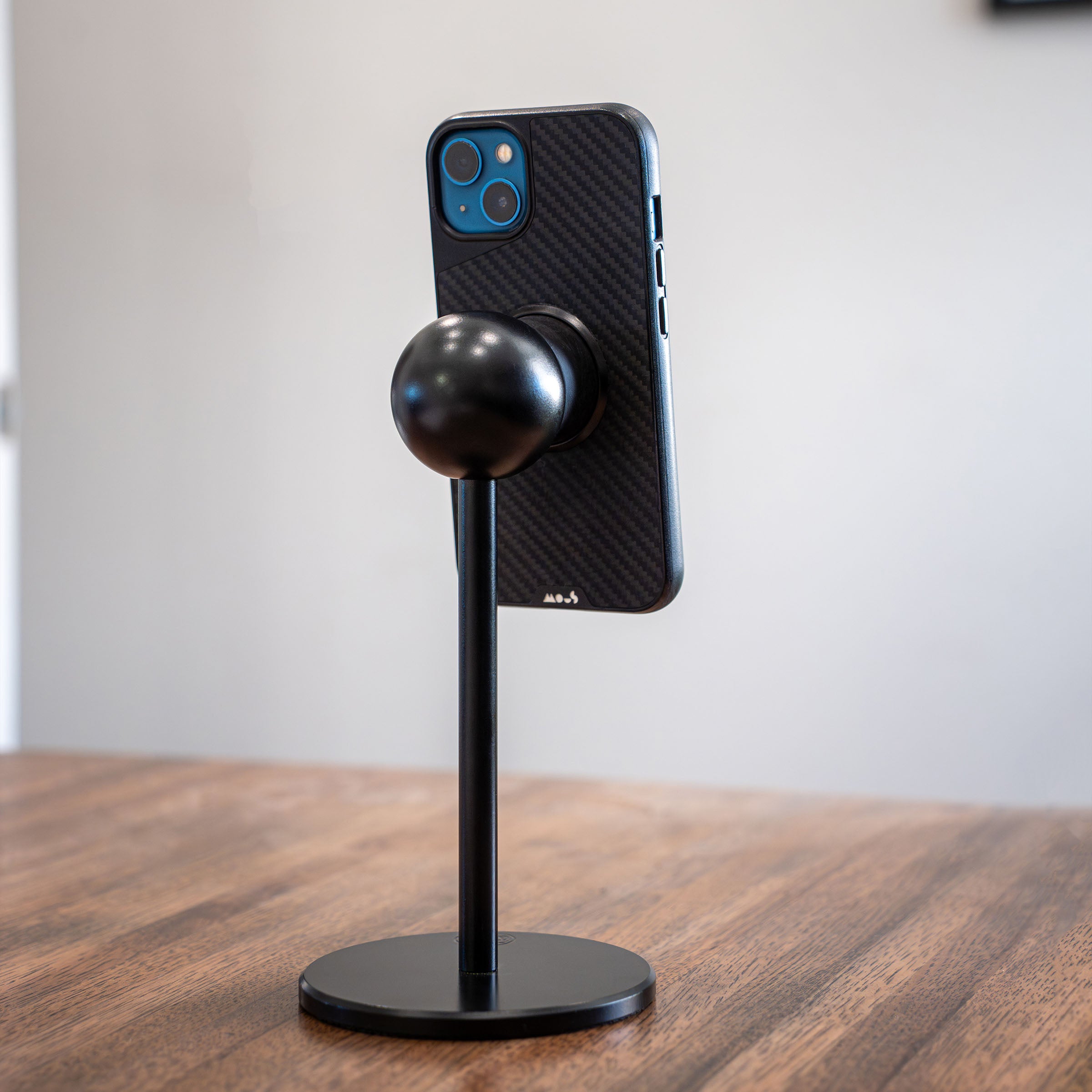 Black iOmount Inductive Charging Disc on an iOmini(shown on iOmini)