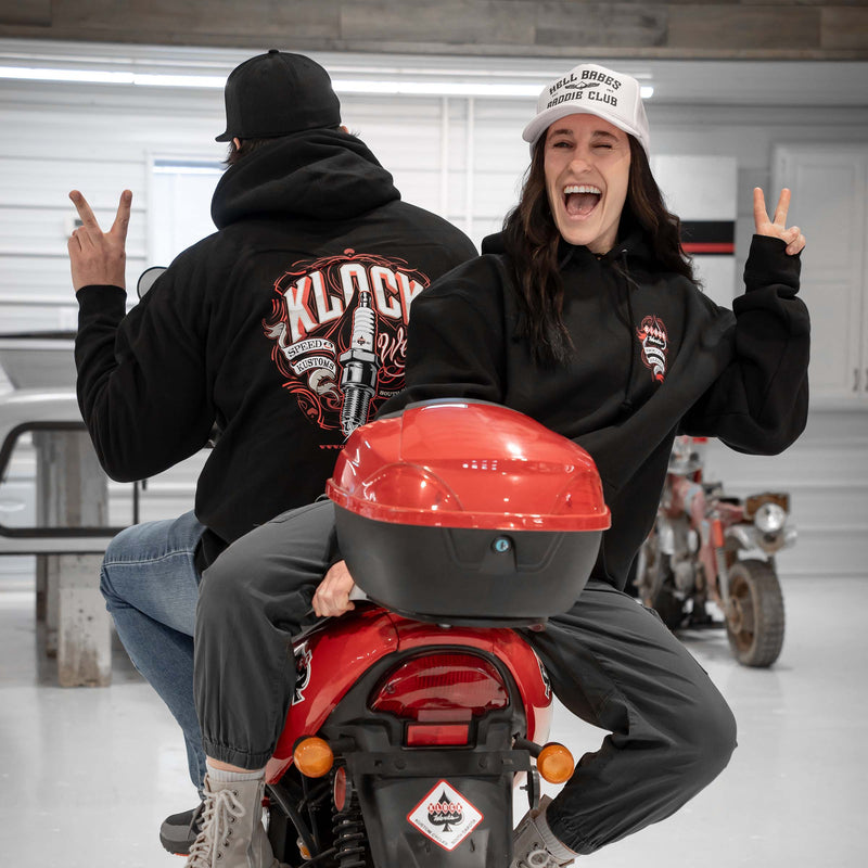 Black Pullover Hoodie with Spark Plug Design on Front Chest (Pullover Models are wearing M and 2XL)