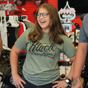 Ashlyn is wearing a large Klock Werks State T-Shirt in Heather Military Green 
