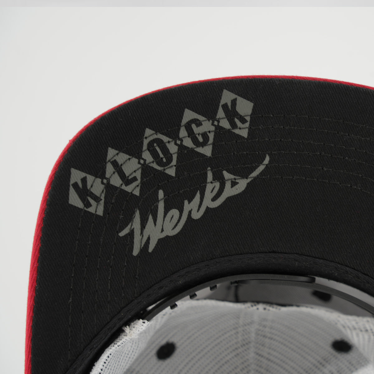 Klock Werks Fist Bump Stripe Trucker Hat for Men with Klock Werks imprinted on the brim