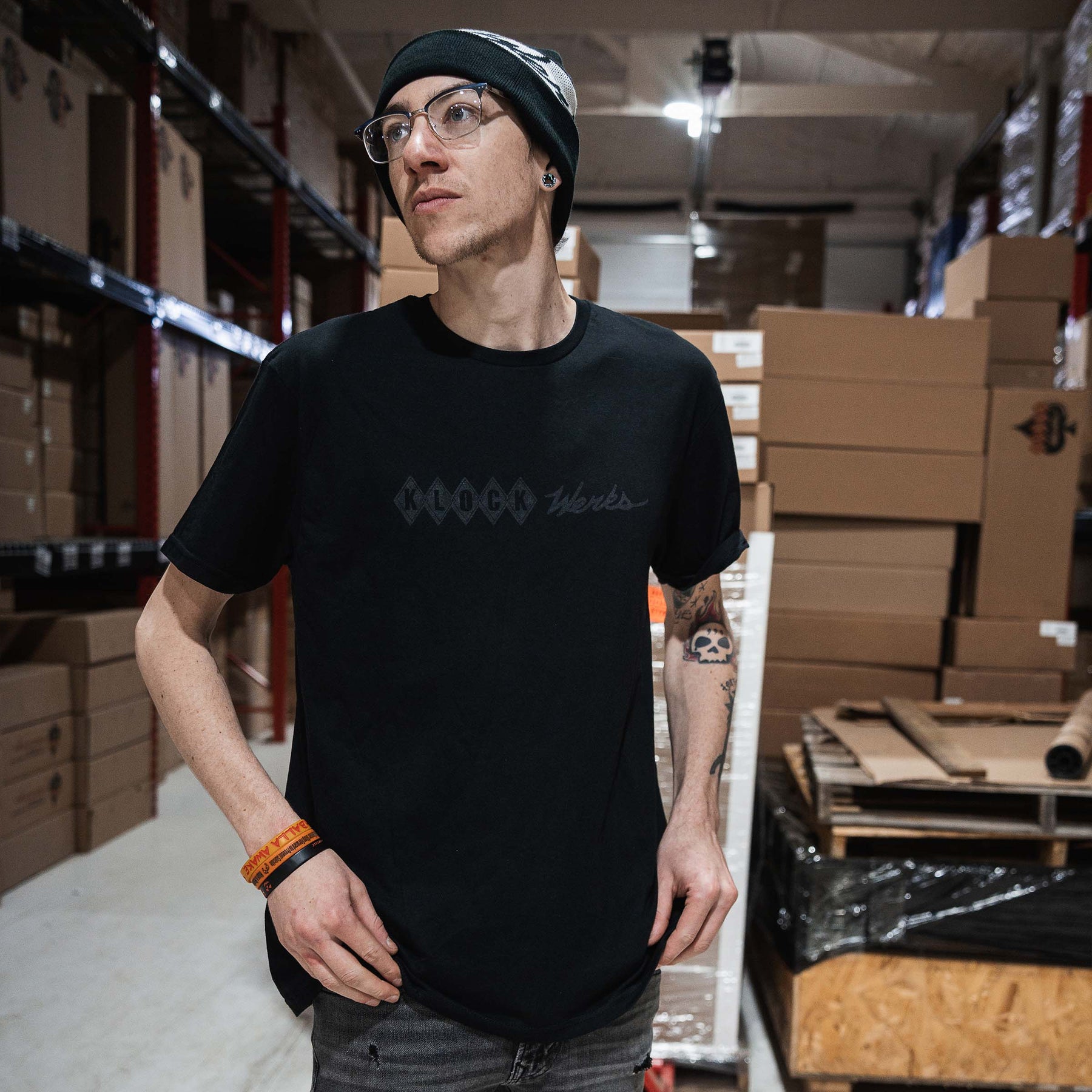 Jordan is wearing a large Klock Werks Fist Bump T-Shirt 