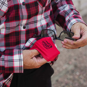 Klock Werks x Dixxon 25th Anniversary Flannel Microfiber cloth inside the bottom left corner to easily clean your glasses or devices without affecting the look or design