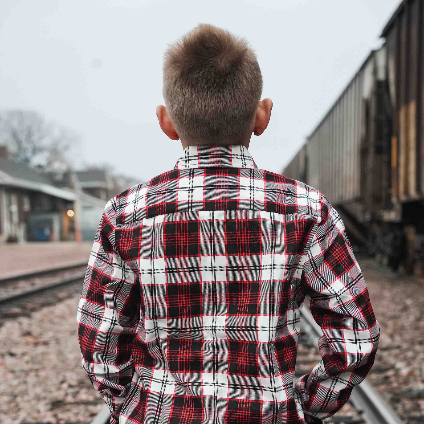 Klock Werks x Dixxon 25th Anniversary Flannel. Brantley is wearing a Youth Large.