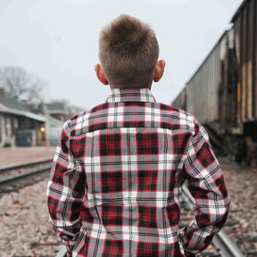 Klock Werks x Dixxon 25th Anniversary Flannel. Brantley is wearing a Youth Large.