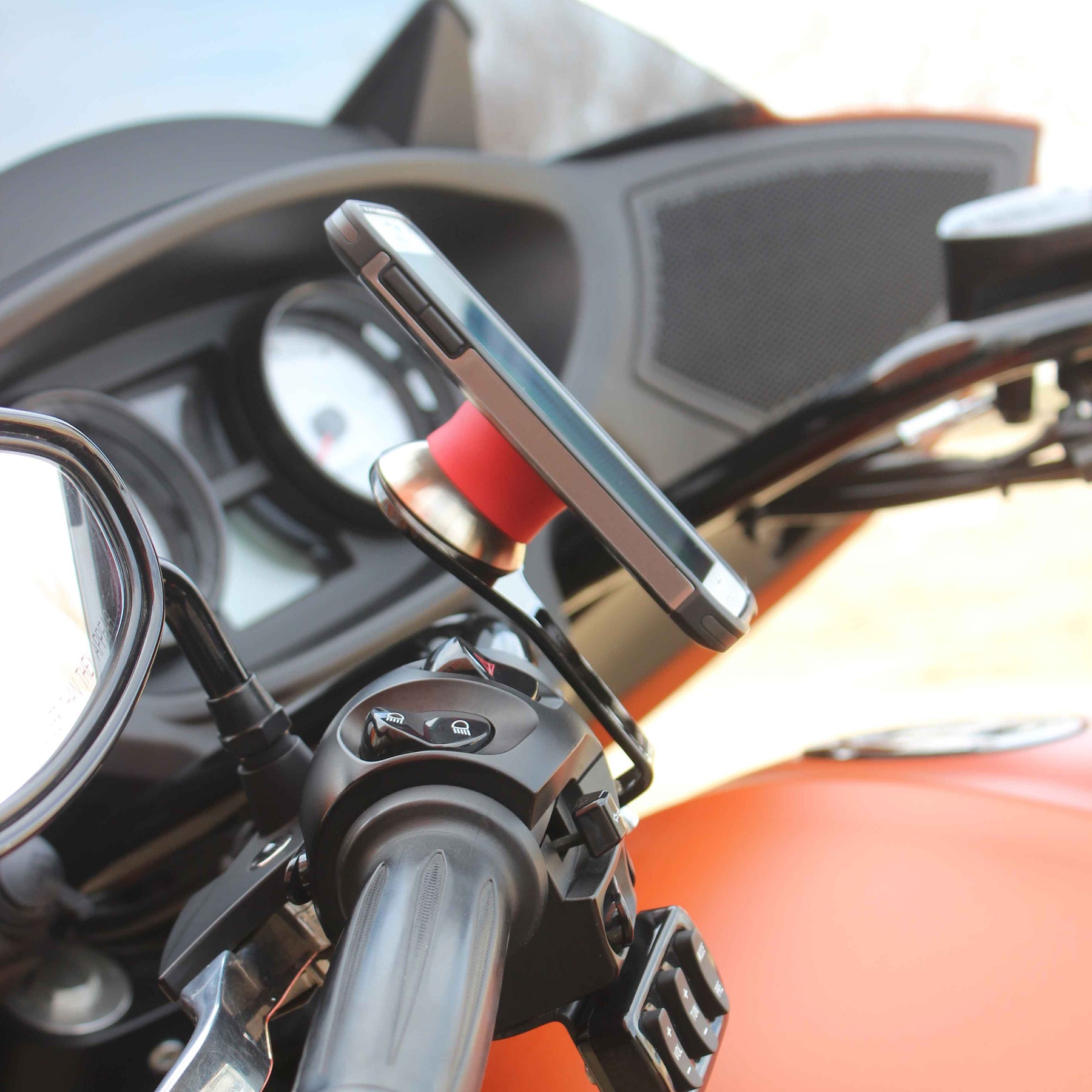 Left Black Perch Handlebar Magnetic Phone Mounts for Victory® Motorcycles shown on bike