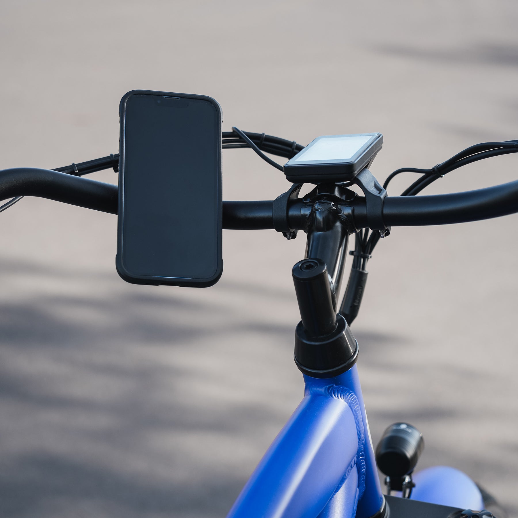 0.875" nomad+ Universal Bar Magnetic Phone Mount shown on eBike handlebar