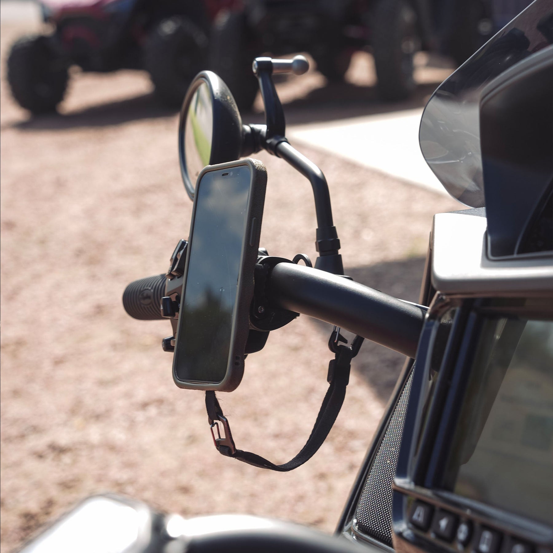 nomad™ Universal Magnetic Phone Mount on bike with phone 