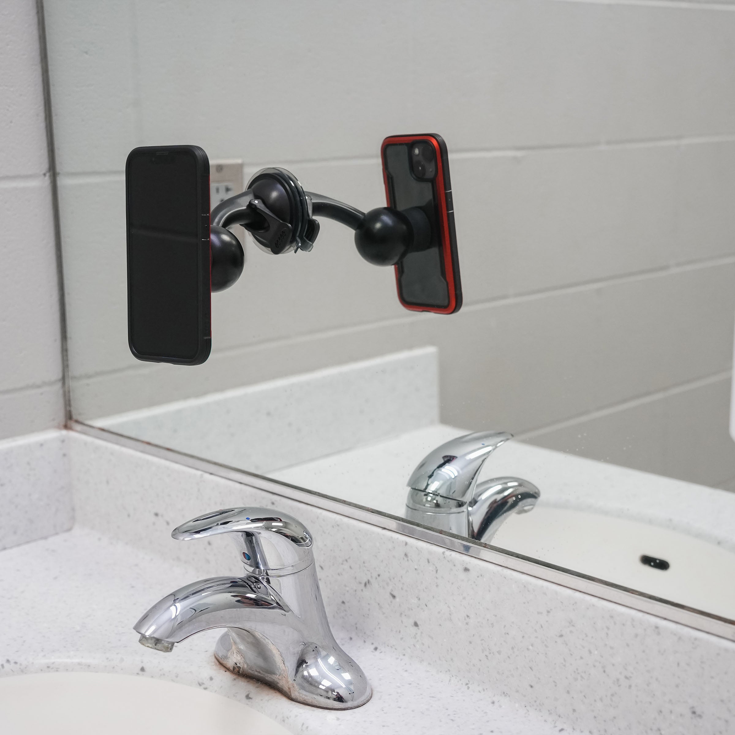 iOtraveler Suction Magnetic Phone Mount shown mounted to mirror(mounted to mirror)